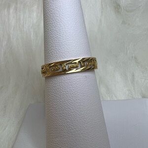 Gold tone Greek key ring band
